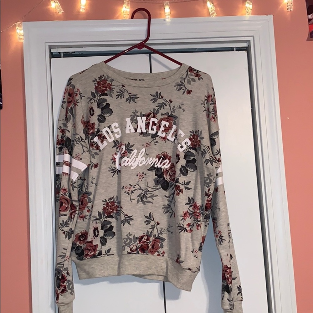 A floral, long sleeve sweatshirt